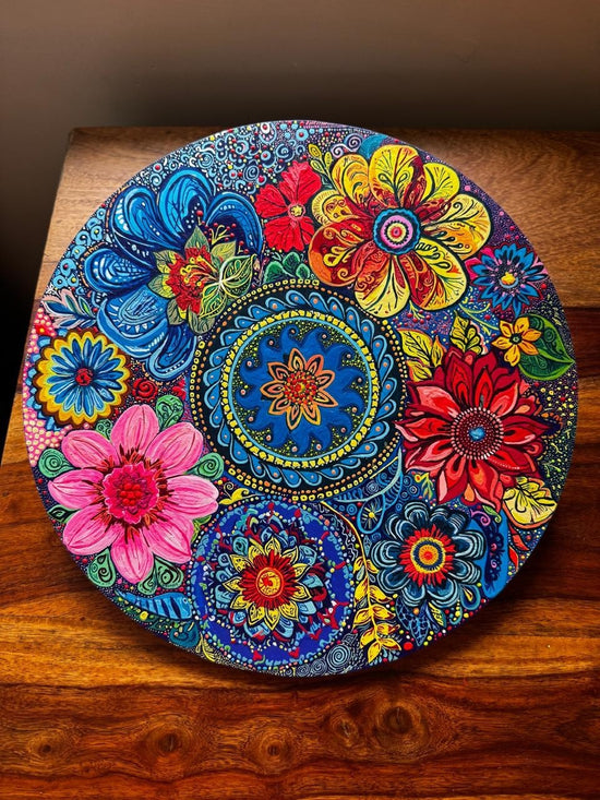 Alekhyart Nature's Garden circular mandala wall art featuring vibrant hand-painted floral patterns in acrylic on wood.